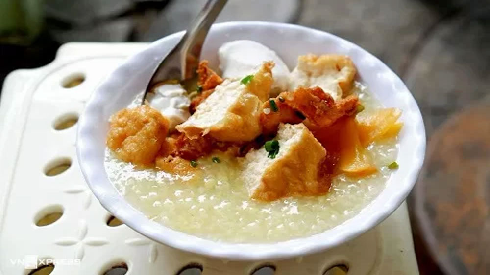 Bean porridge with tofu, pickled eggplants in Hanoi's Old Quarter