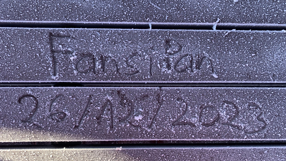 Ice, frost glisten on Fansipan