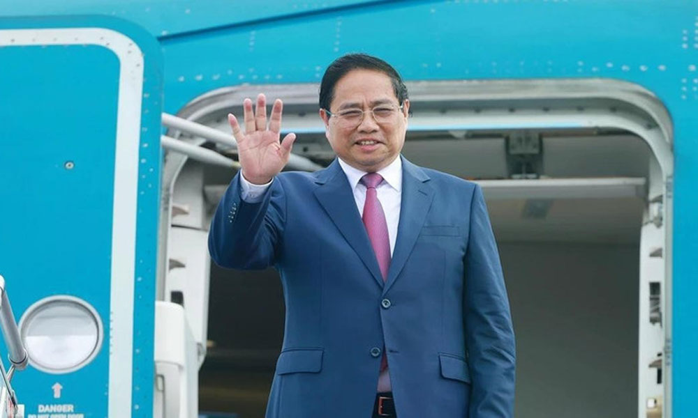 PM Pham Minh Chinh leaves for WEF meeting, working visit to China