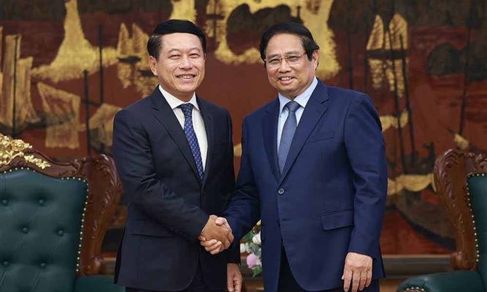 Vietnam willing to share experience in SOE reform with Laos: PM