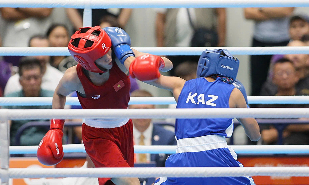 Vietnamese boxer defeats reigning world champion to reach Asian Games final